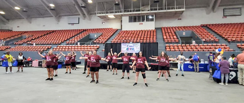 The LunaChicks performing and painting faces at the 2024 Community Health & Wellness Expo at the Monroe Civic Center.