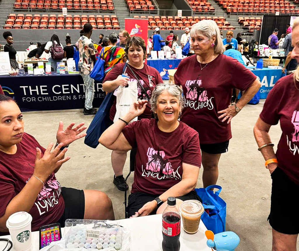 The LunaChicks performing and painting faces at the 2024 Community Health & Wellness Expo at the Monroe Civic Center.