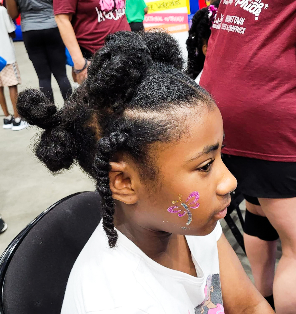 The LunaChicks performing and painting faces at the 2024 Community Health & Wellness Expo at the Monroe Civic Center.