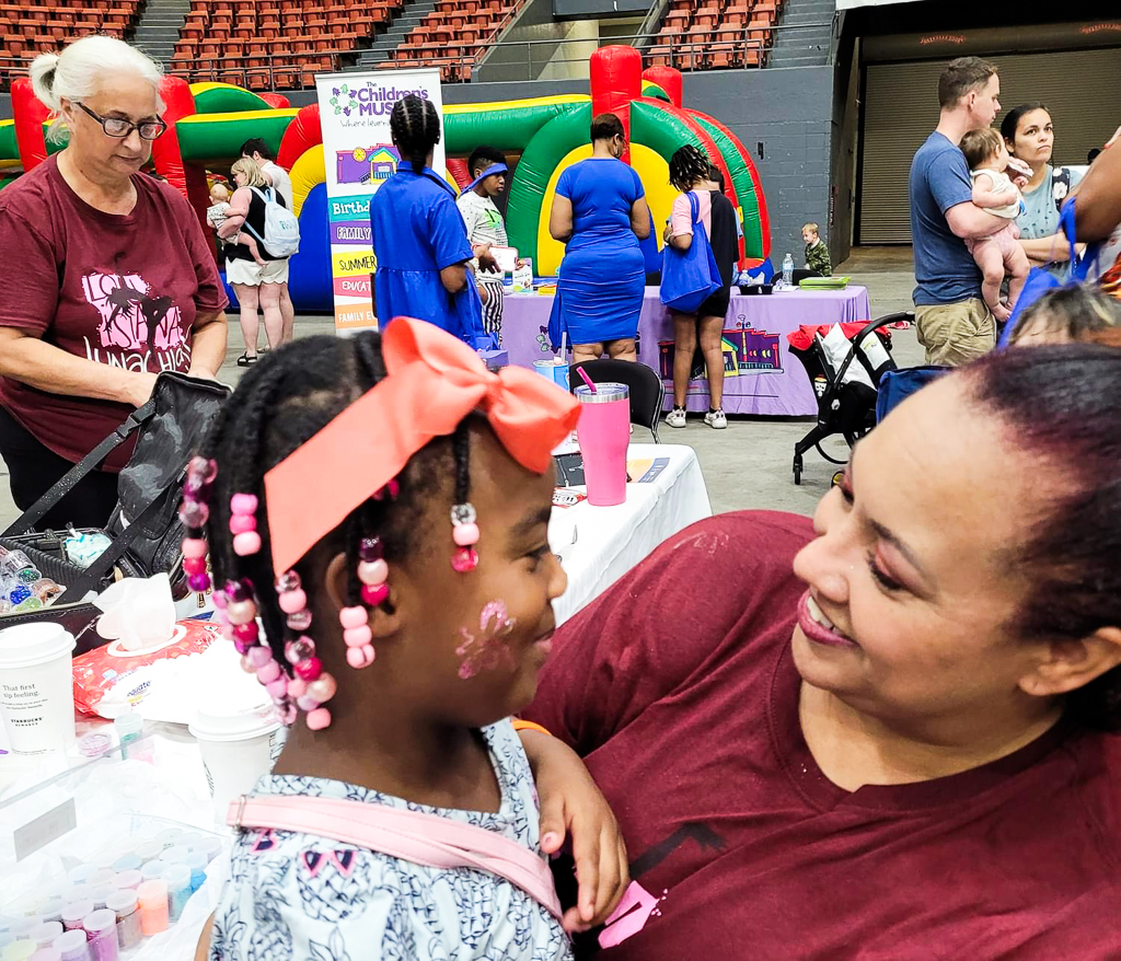 The LunaChicks performing and painting faces at the 2024 Community Health & Wellness Expo at the Monroe Civic Center.